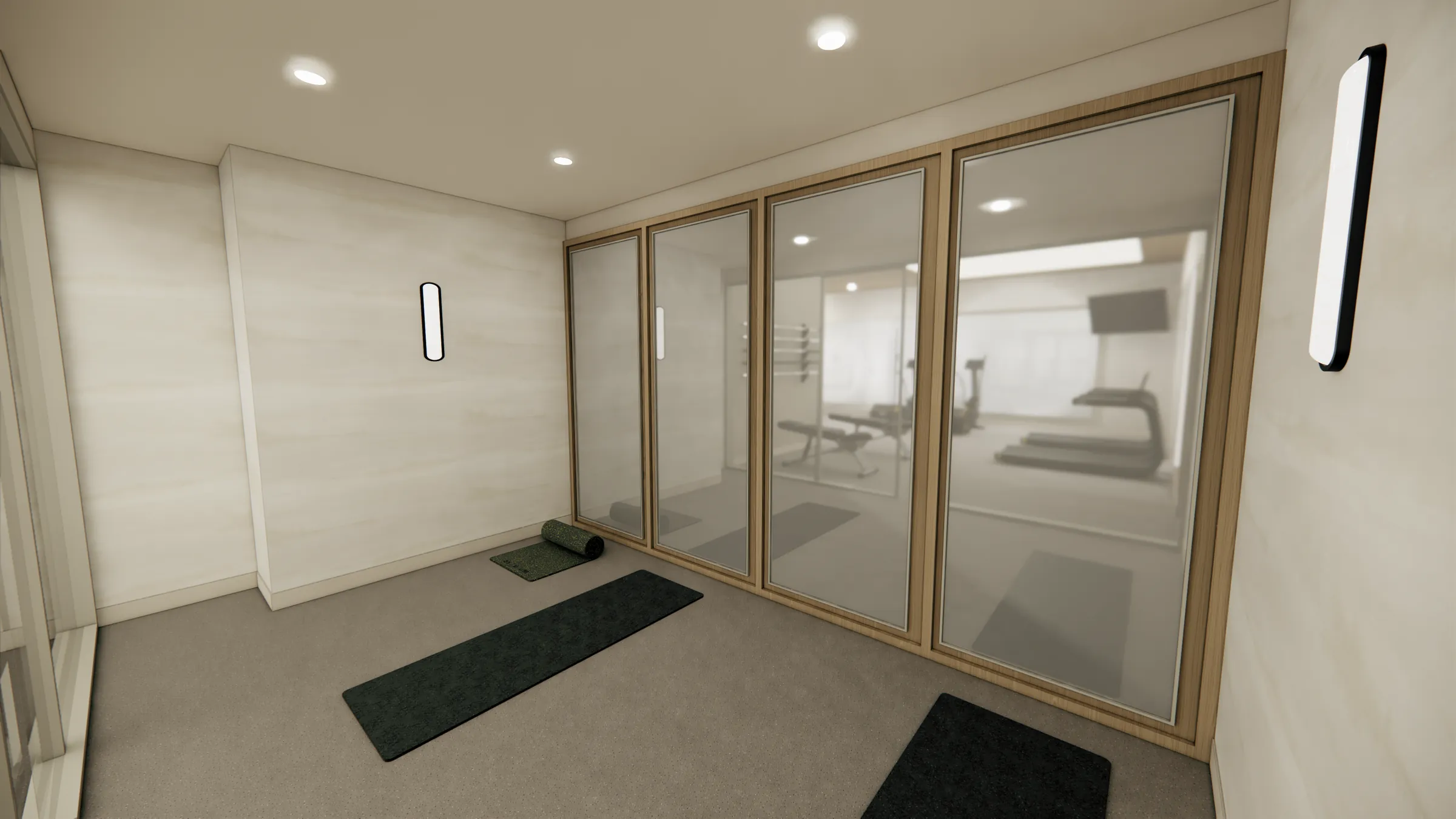 Glass-walled yoga studio with mats at Serenity Kelowna